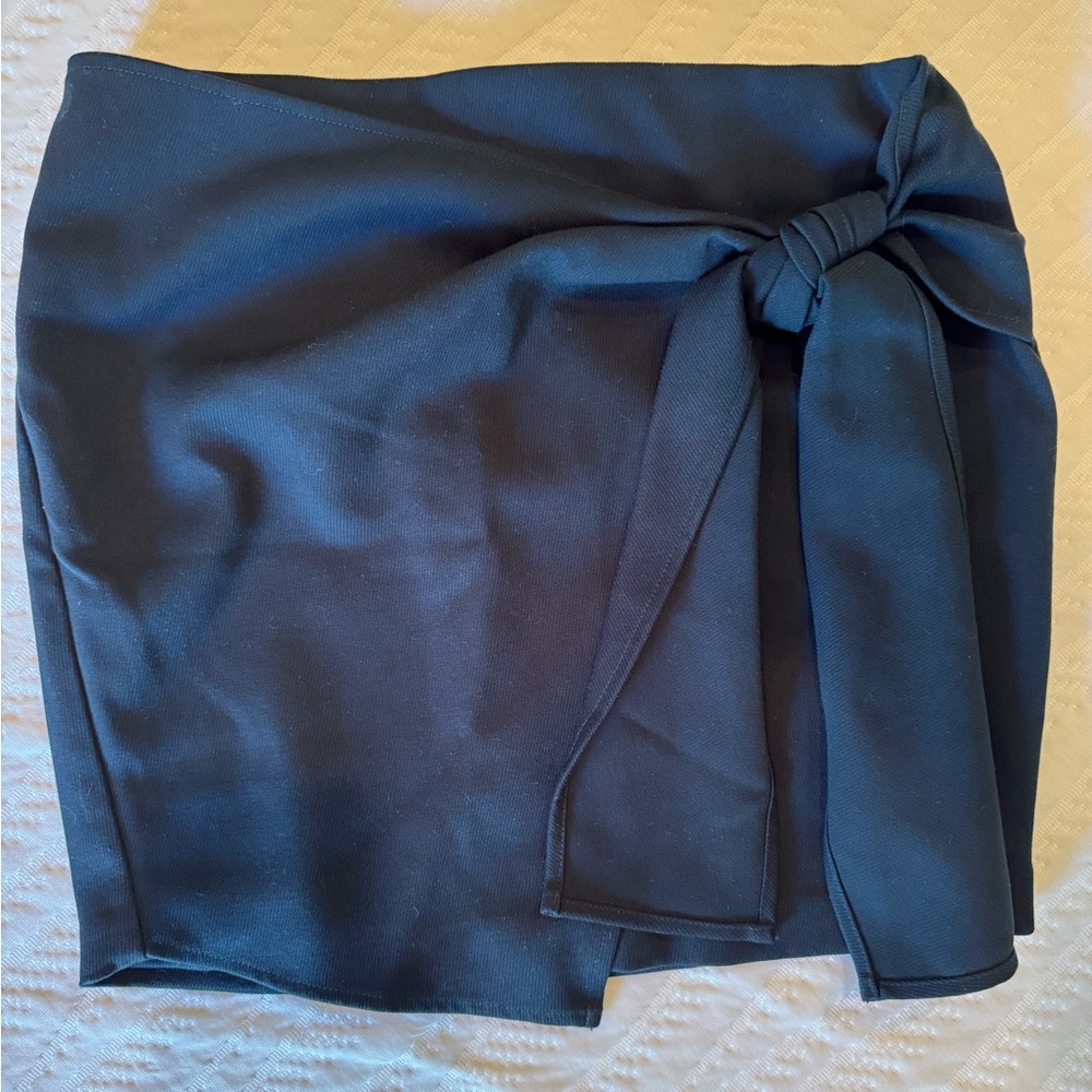 Naked Zebra dark green skirt with bow in front, zipper back size small